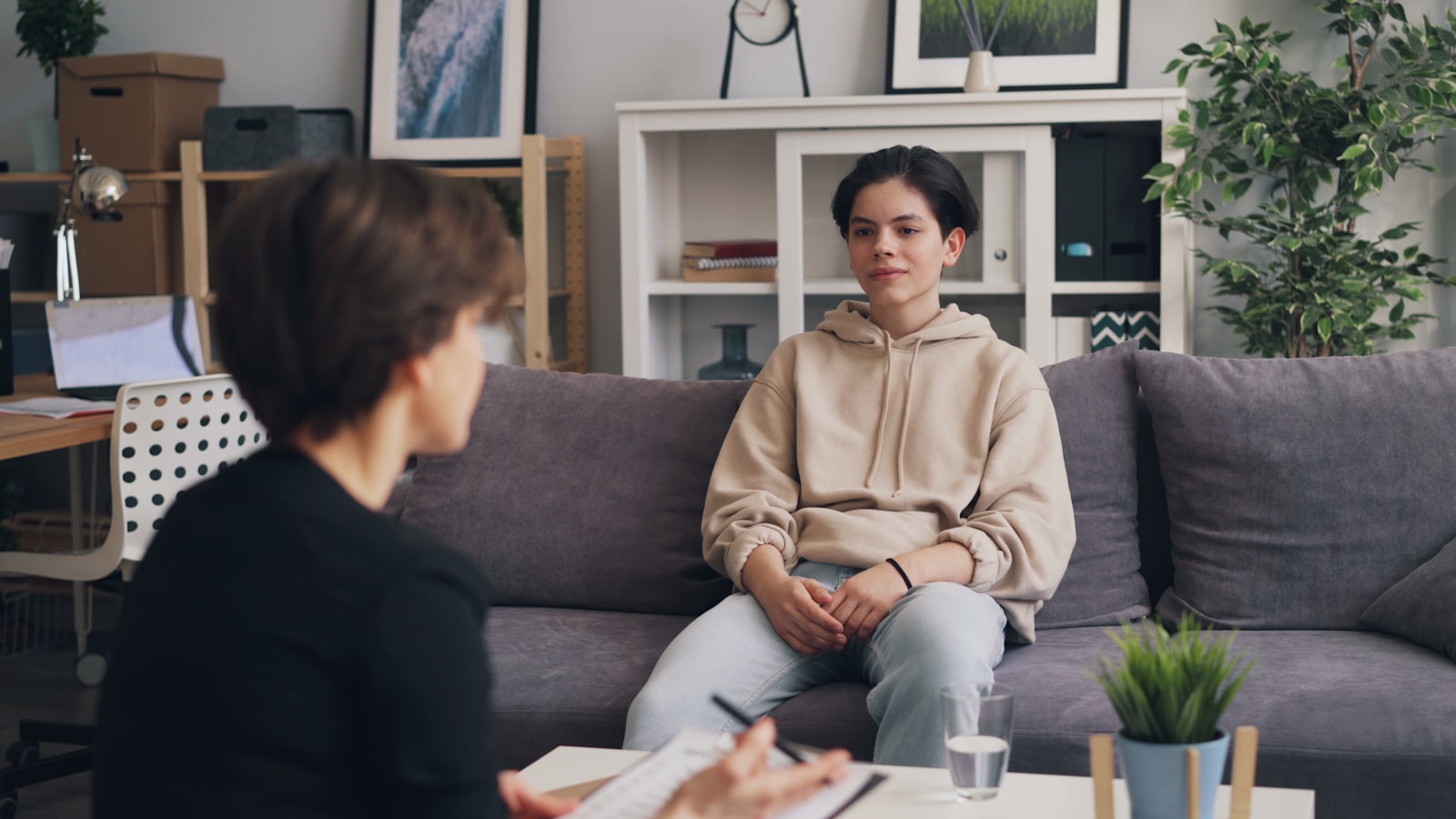 A supportive therapy conversation in a calm private-practice office near Cerritos, California